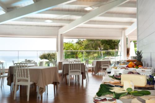 A restaurant or other place to eat at Casa Ferretti di Ferretti Village