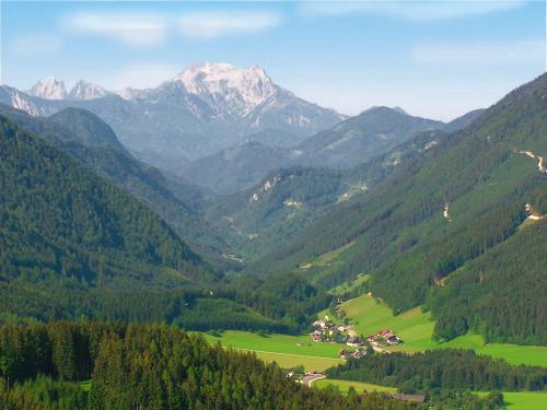 a view of a valley with mountains in the background at Alpenhotel Ensmann in Göstling an der Ybbs