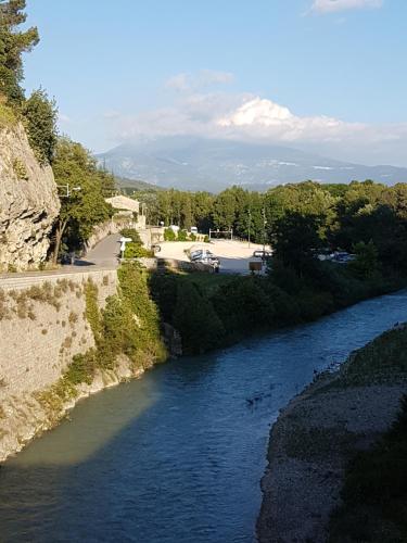 a view of a river from a bridge at Gite Les Lavandes in Vaison-la-Romaine