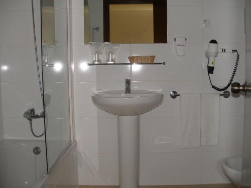 Ванная комната в Hotel Praia Dourada