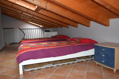Postel nebo postele na pokoji v ubytování Il Melograno b&b Apartament