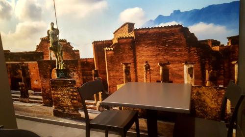 Imagine din galeria proprietății Pompei Inn Ruins B&B Luxury Suite în Pompei