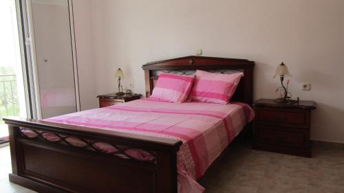 Postel nebo postele na pokoji v ubytování Anastasia's House