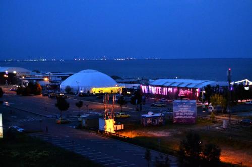 a night view of a festival with a tent at Luna Rossa Sumerland in Mamaia