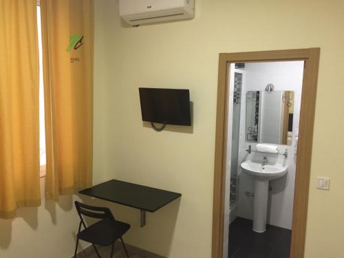 Ένα μπάνιο στο JQC Rooms