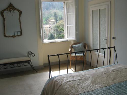 A bed or beds in a room at Villa Rosalena