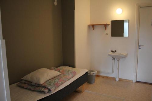 Postel nebo postele na pokoji v ubytování STF Vandrarhem Sälen