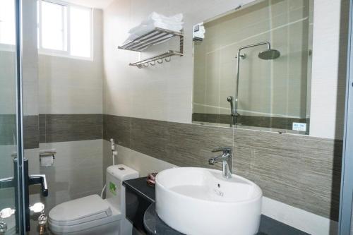 Koupelna v ubytování Aries Hotel