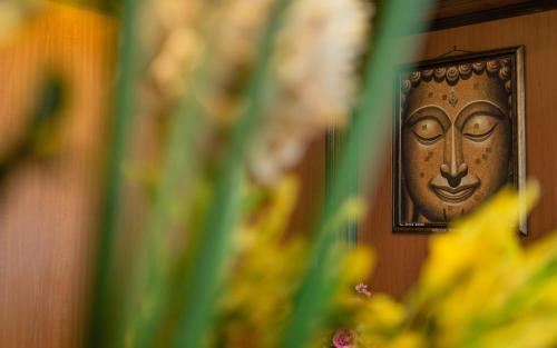 a door with a brass face on it at Krabi Villa Phu Khao Private Resort in Klong Muang Beach