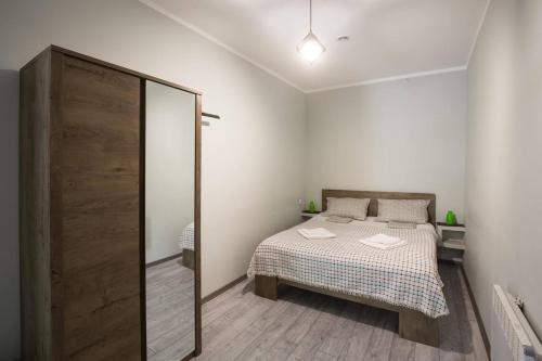Llit o llits en una habitació de Tbilisisi