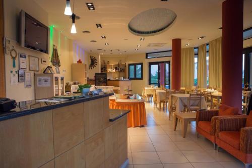 A restaurant or other place to eat at Aeolian Gaea Hotel