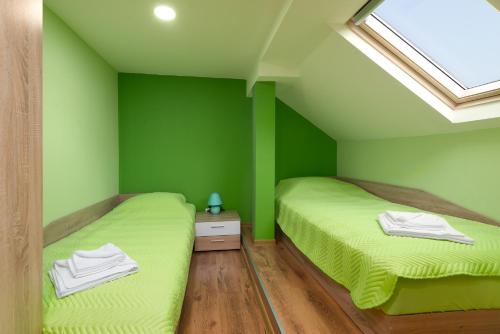 Katil atau katil-katil dalam bilik di Serdika Round Tower Apartments