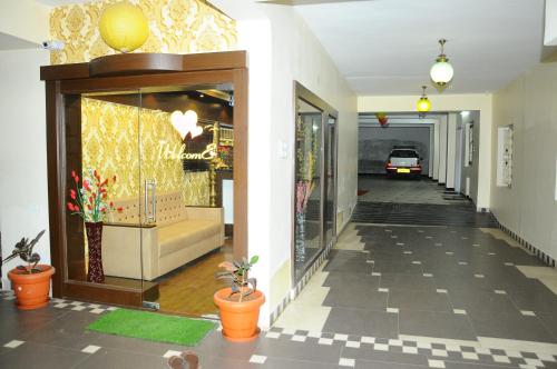 Fotografie z fotogalerie ubytování Hotel Lovely Nest v destinaci Kójamputtúr