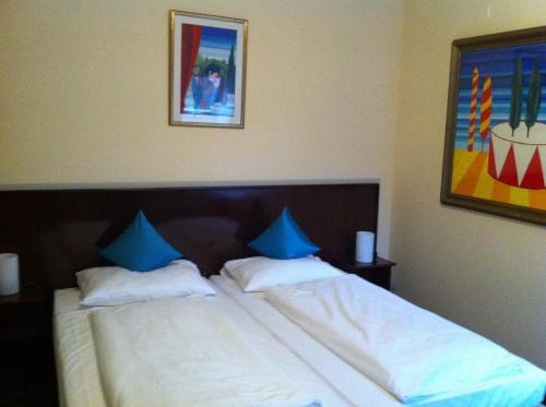 Una cama o camas en una habitación de Hotel Worpsweder Tor