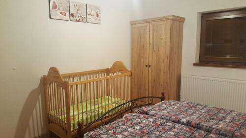 Postel nebo postele na pokoji v ubytování Wellness Chata Tatry