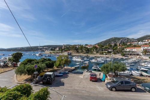 a group of boats parked in a marina at Apartments Lukrecia in Hvar