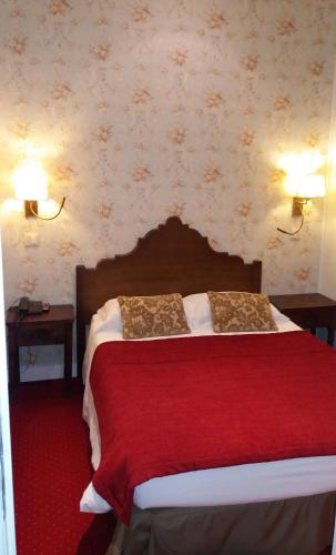Ένα ή περισσότερα κρεβάτια σε δωμάτιο στο Hotel Dom Sancho I