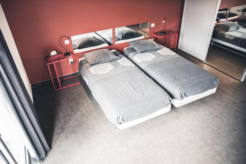 Ein Bett oder Betten in einem Zimmer der Unterkunft Vakantiewoning Hakuna Matata