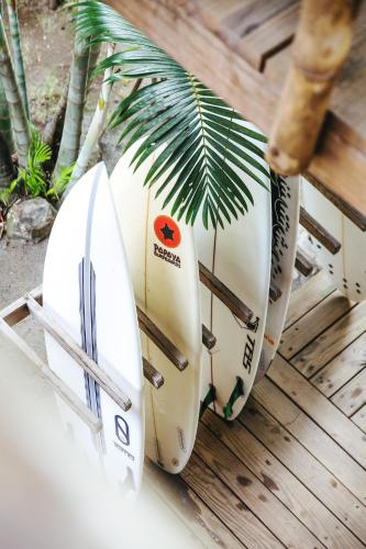 two surfboards sitting next to each other on a table at Eco del Mar in La Libertad