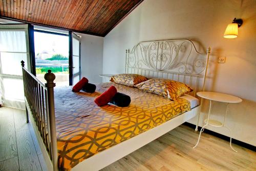 Кровать или кровати в номере Amazing sea views Veglia house