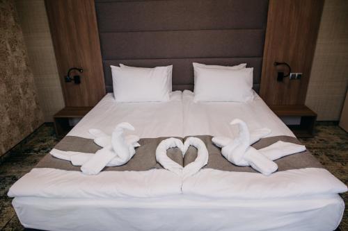 Postel nebo postele na pokoji v ubytování Hotel Leva - Vratsa
