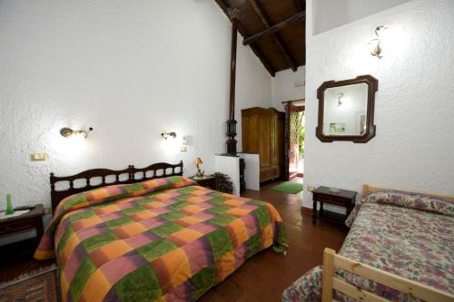 En eller flere senge i et værelse på Cirasellaetna