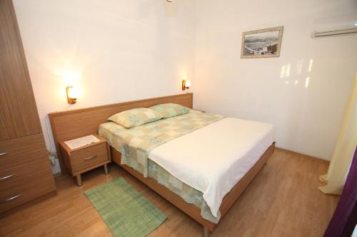 Postel nebo postele na pokoji v ubytování Rooms with the Sea View