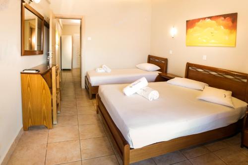Una cama o camas en una habitación de acquablue apartments