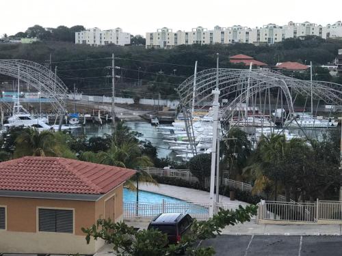 a view of a marina with ferrisacks in the background at Calle Hollanda 3 Bedroom Home in San Juan