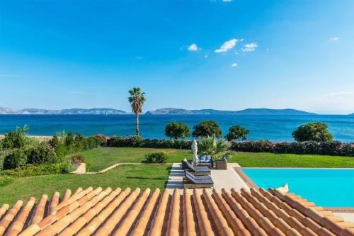 a view of the ocean from the roof of a house at Therme Sea Luxury Lodge in Thermisia