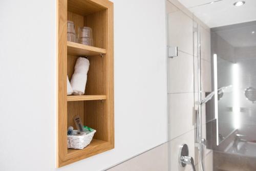 Ванная комната в Wellnesshotel Zum Koch