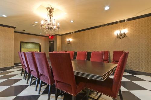 a conference room with a table and chairs at Sapphire in South Padre Island