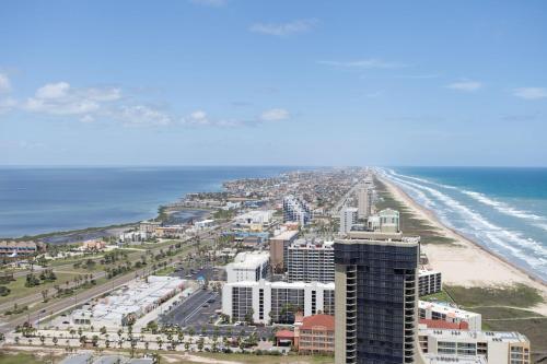 an aerial view of a beach and the ocean at Sapphire in South Padre Island