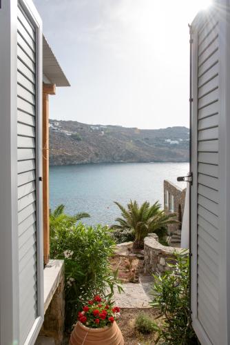 a view of the water from a house at Etesians Suites & Villas in Super Paradise Beach