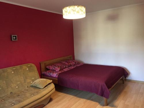 Postel nebo postele na pokoji v ubytování Cat Garden Domina Apartments Riga