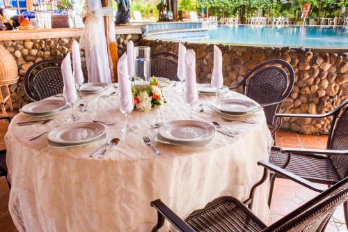 Restoran atau tempat lain untuk makan di Eco Hotel Villa Martha