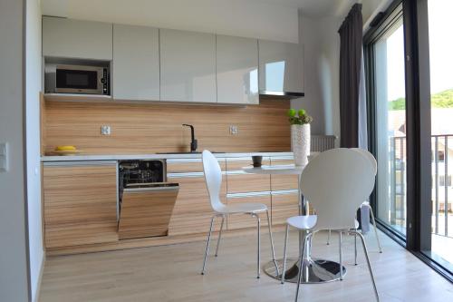 Kuchyňa alebo kuchynka v ubytovaní Apartament Horyzont 405 Międzyzdroje