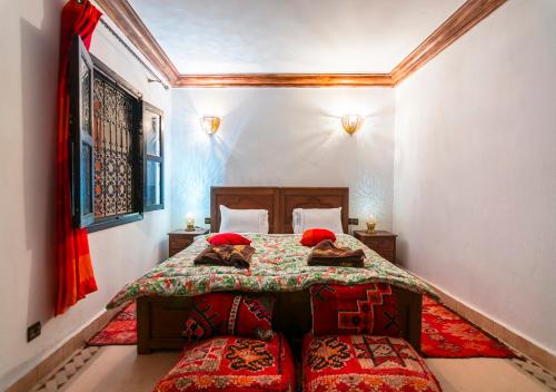 Giường trong phòng chung tại Riad Marwa Marrakech