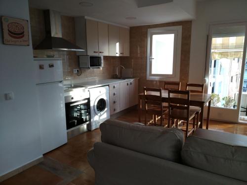 Кухня или мини-кухня в Apartament LUISA
