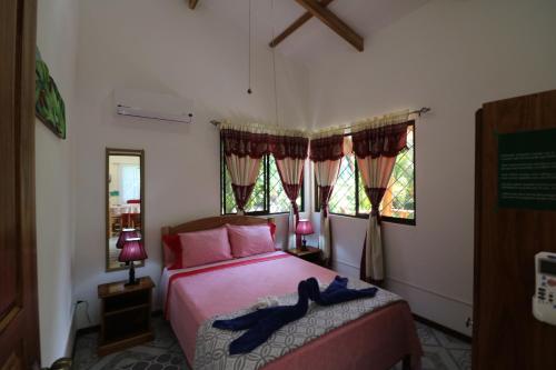 Кровать или кровати в номере New Caribe Point