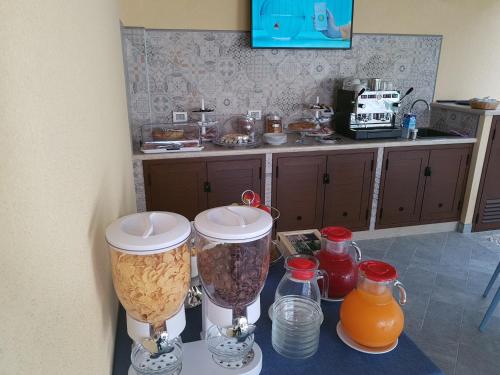 Køkken eller tekøkken på B&B Aloe Comfort Rooms