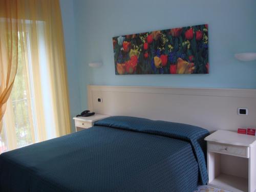 Postel nebo postele na pokoji v ubytování B&B La Dimora Di Alfonso
