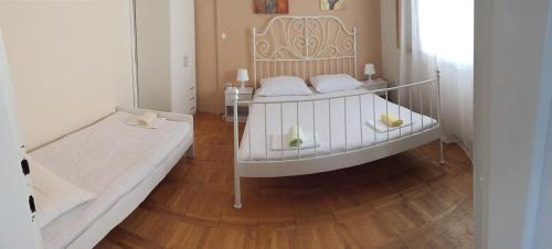 Un pat sau paturi într-o cameră la Jerkovic Apartment