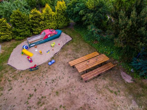 an overhead view of a picnic table and a bench at Rusnietis in Rusnė