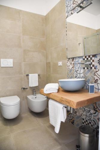 Un baño de Hotel Belsito