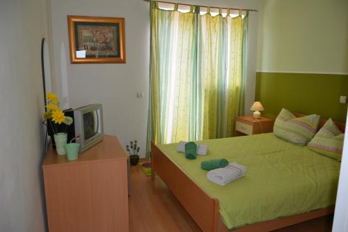 Postel nebo postele na pokoji v ubytování Apartments Lans