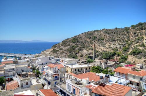 a view of the town of positano and the ocean at Kalypso in Agia Galini