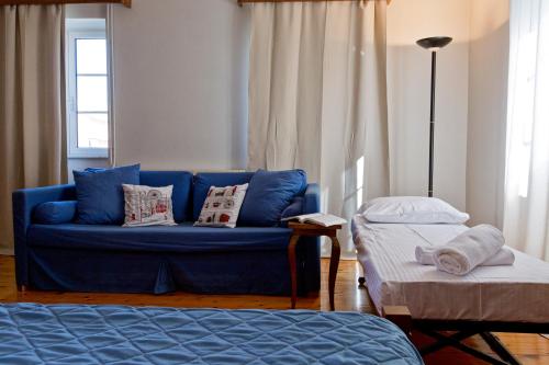 Posteľ alebo postele v izbe v ubytovaní San Rocco Sqr. Apartment