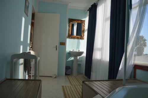 Χώρος καθιστικού στο Fisherhaven Travellers Lodge