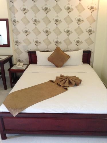 Cama o camas de una habitación en Ha Anh Hotel - Mui Ne